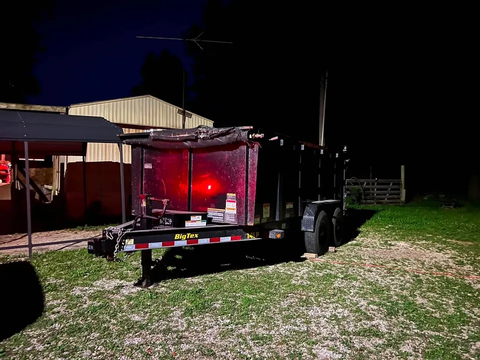 TX2 dump trailer staged at dusk